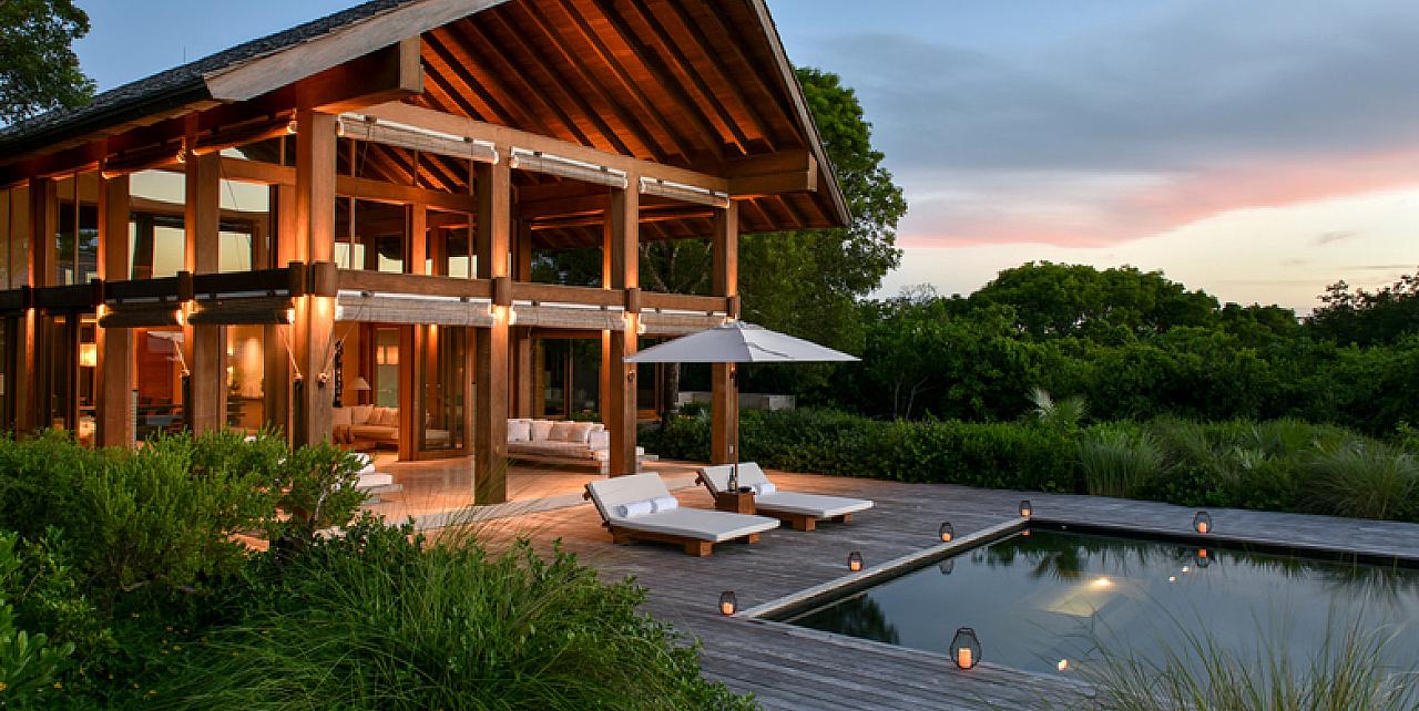 https://www.worldwidedreamvillas.com/sites/default/files/styles/firstshot/public/Parrot%20Cay%20-%20Private%20Estate%20-%20%20Point%20House%20%20%20Outdoor%20Pool%20Area%20%20%20Sundown.jpg?itok=x2rra-Up